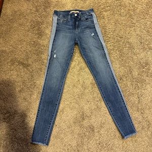 Joe’s jeans with lighter denim stripe on each side